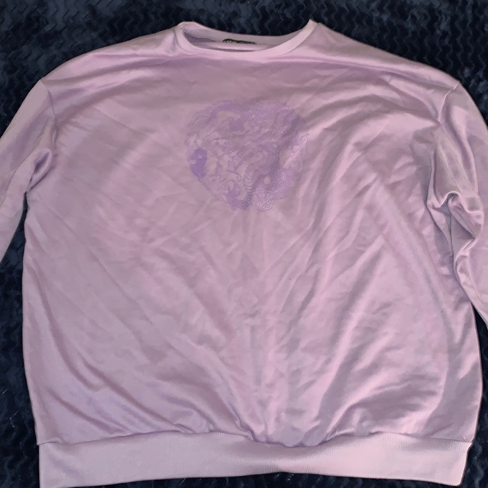 Purple hoodie with graphic dragon